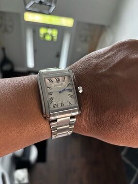 Invicta Silver Watch with Blue Hands and Roman Numerals